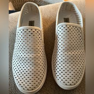 Steve Madden while shoes